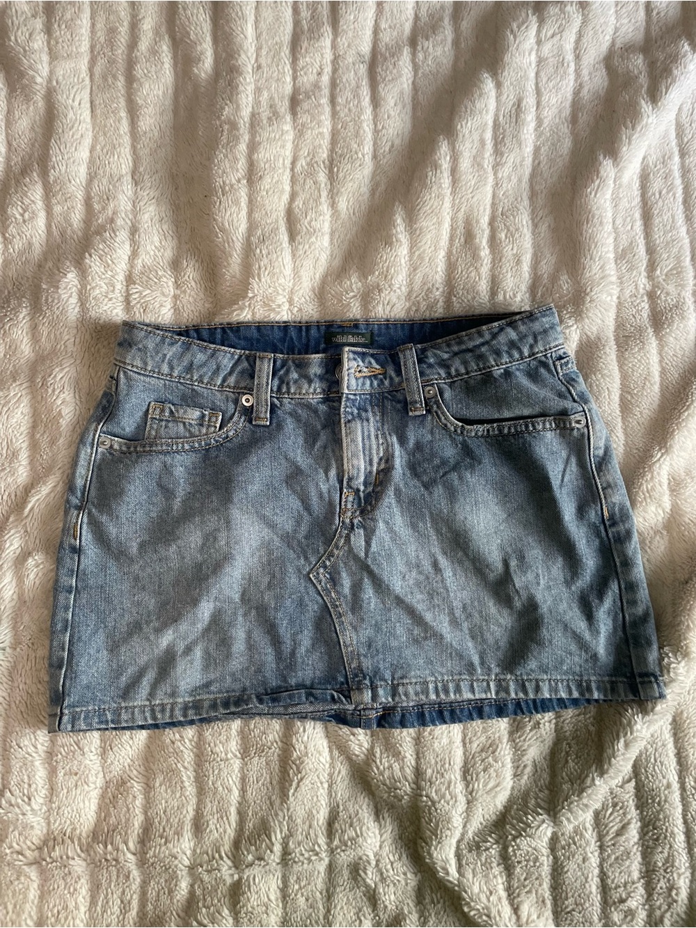 Y2K mid rise denim skirt with cargo back pockets with light wash vintage vibe